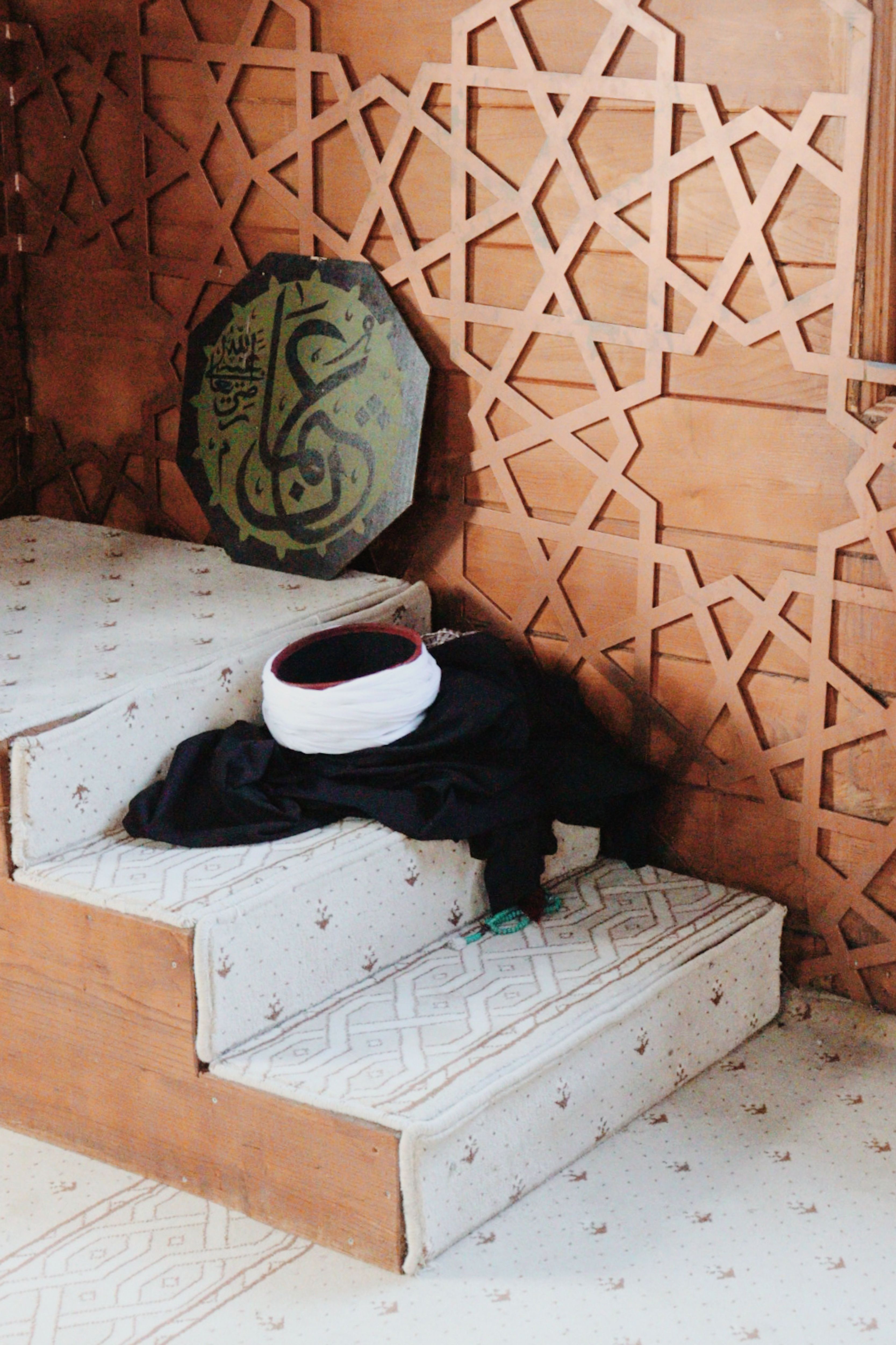 High-quality image showcasing ornate Islamic wall decor and traditional items indoors.
