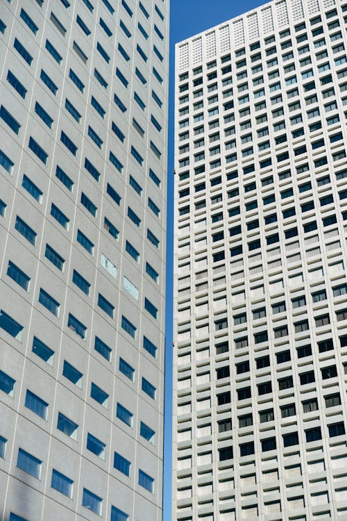 Free Low-Angle Shot of High-Rise Buildings Stock Photo