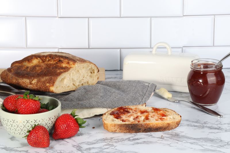 Thick sourdough toast with butter served for breakfast