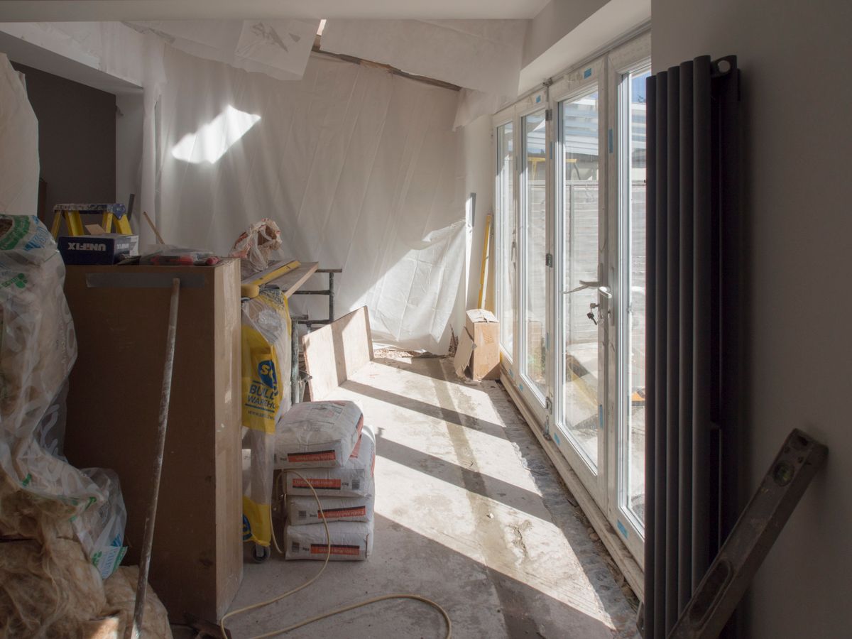 Bright residential room undergoing renovation