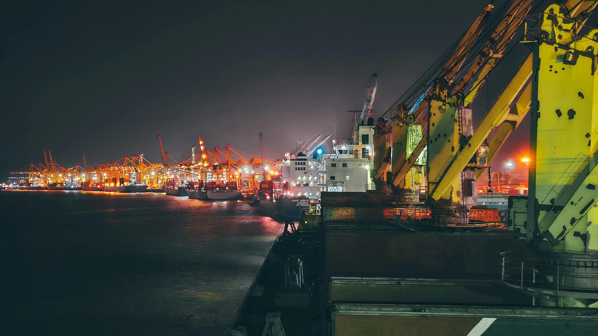 Cargo Ships Moored at Night