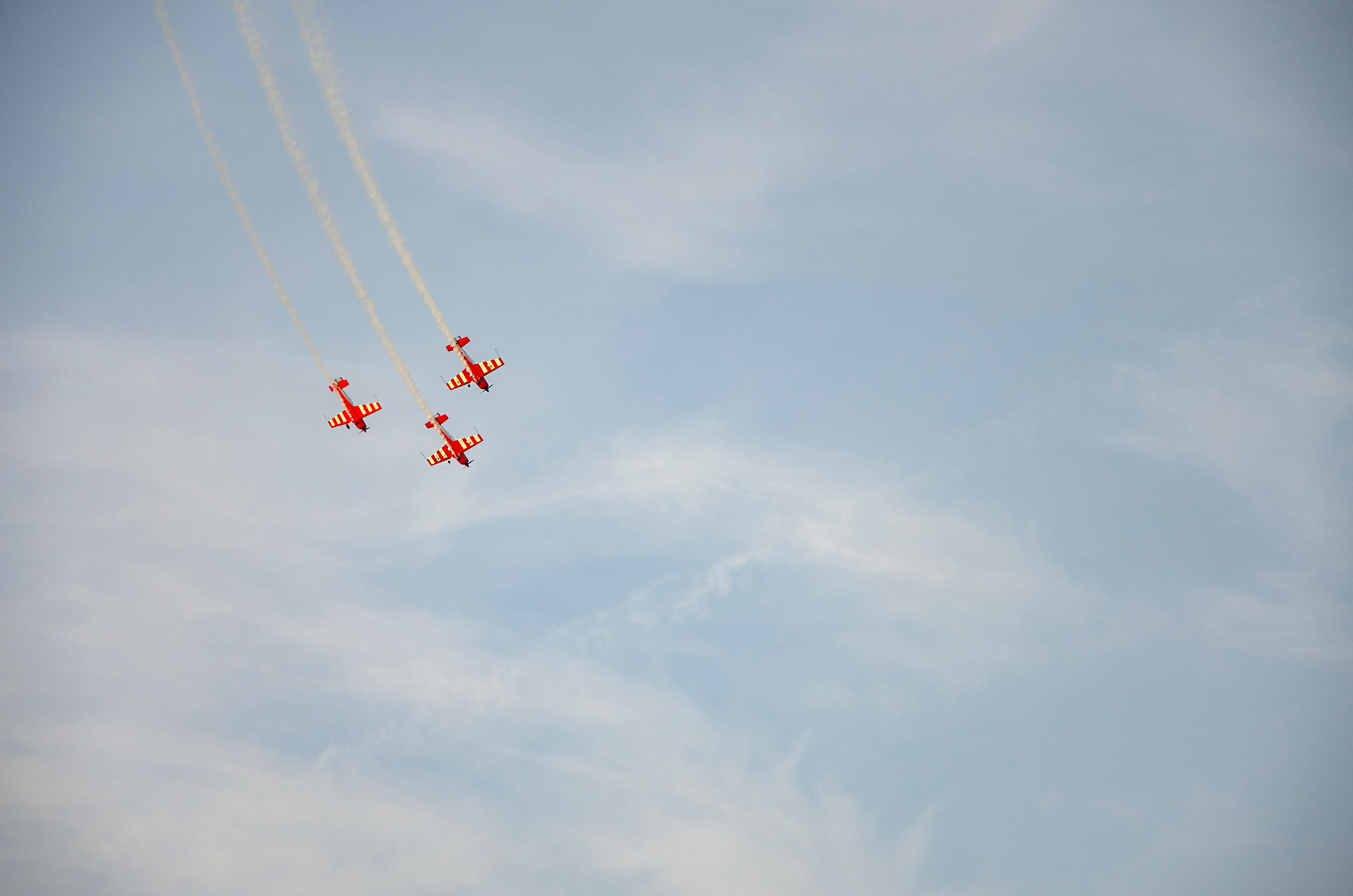 A group of planes flying in the sky · Free Stock Photo