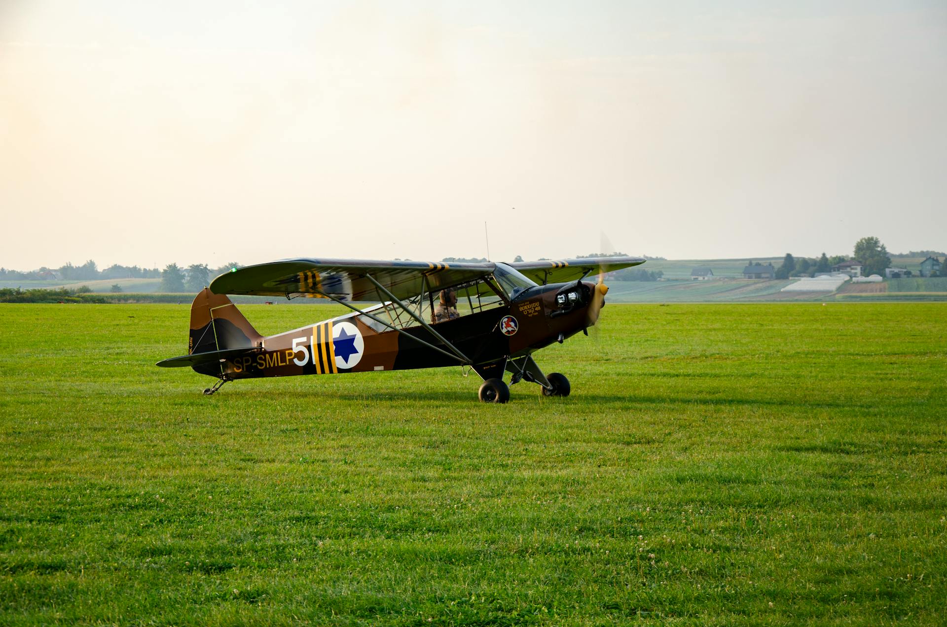 Vintage Airplane on an Airfield