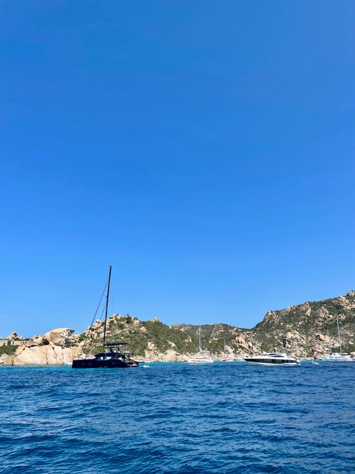 Free Explore the stunning seascape of La Maddalena, Sardinia with rocky cliffs and tranquil blue waters. Stock Photo