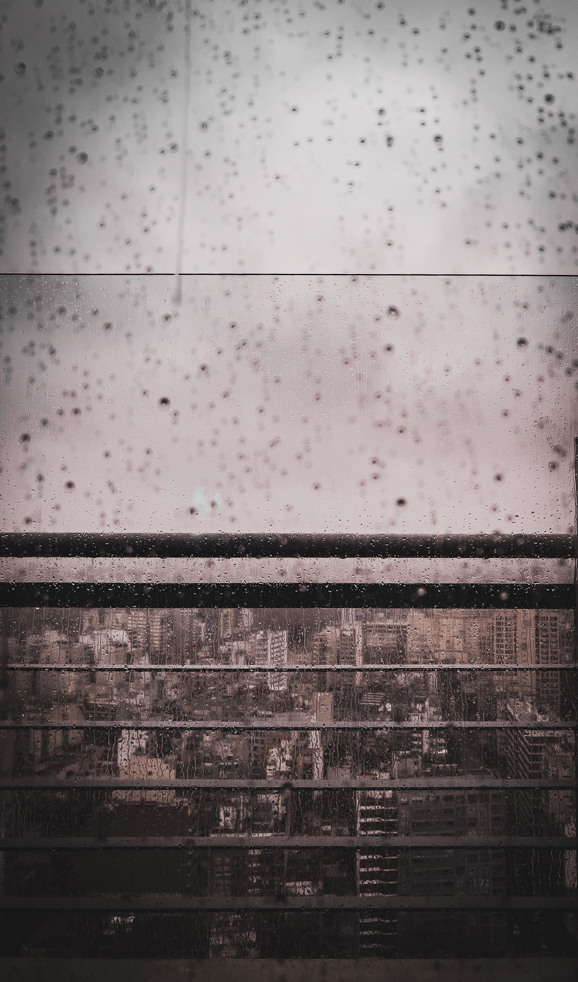 A photo of a window with rain on it · Free Stock Photo