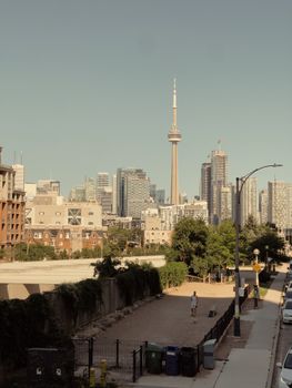 Scenic view of Toronto's skyline including the iconic CN Tower under a clear sky.