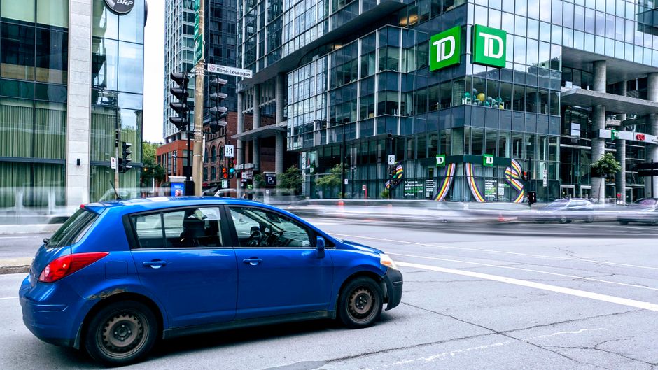 Traveler picking up rental car at a Canadian airport