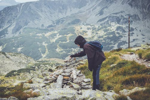 Person Standing on Hill