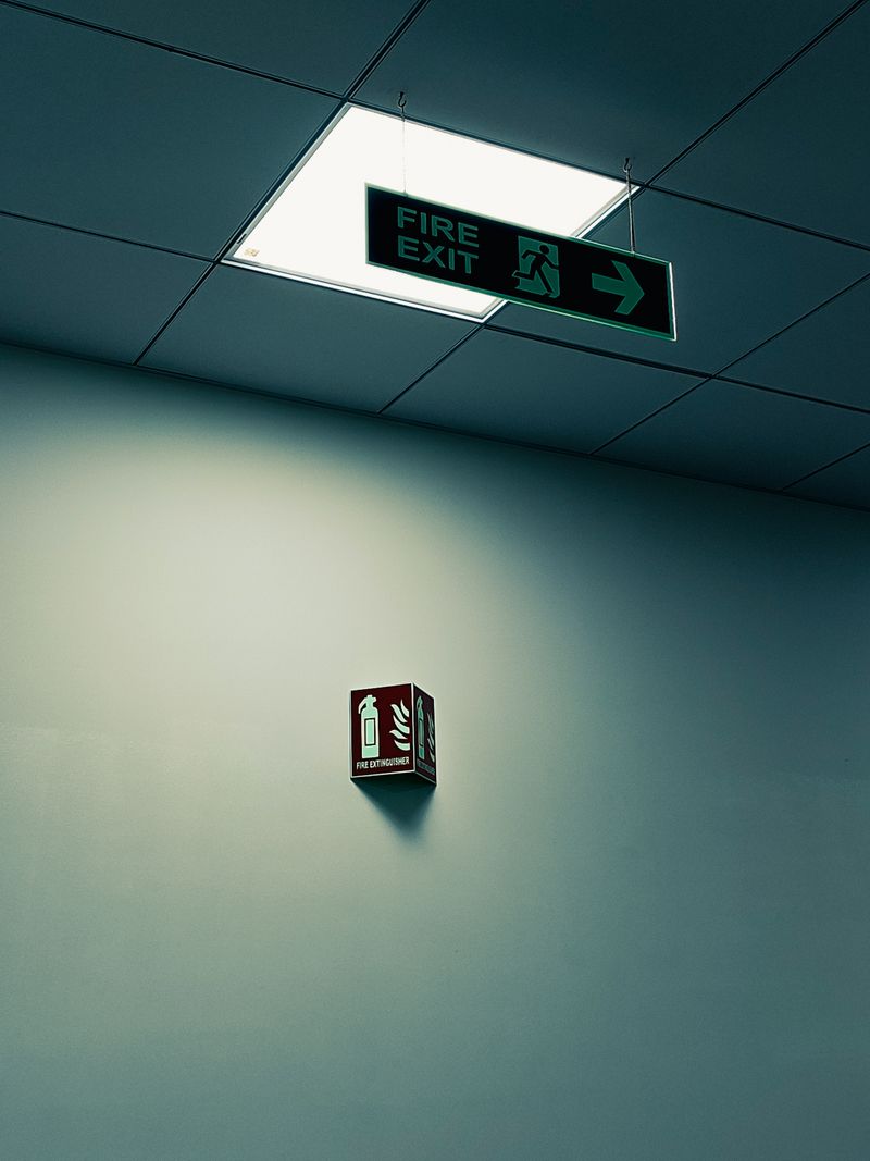 Illuminated fire exit and safety signage