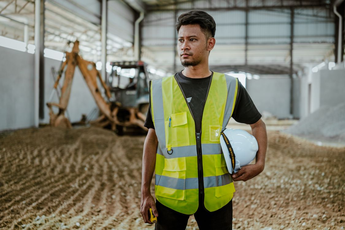 general contractor at construction site professional work