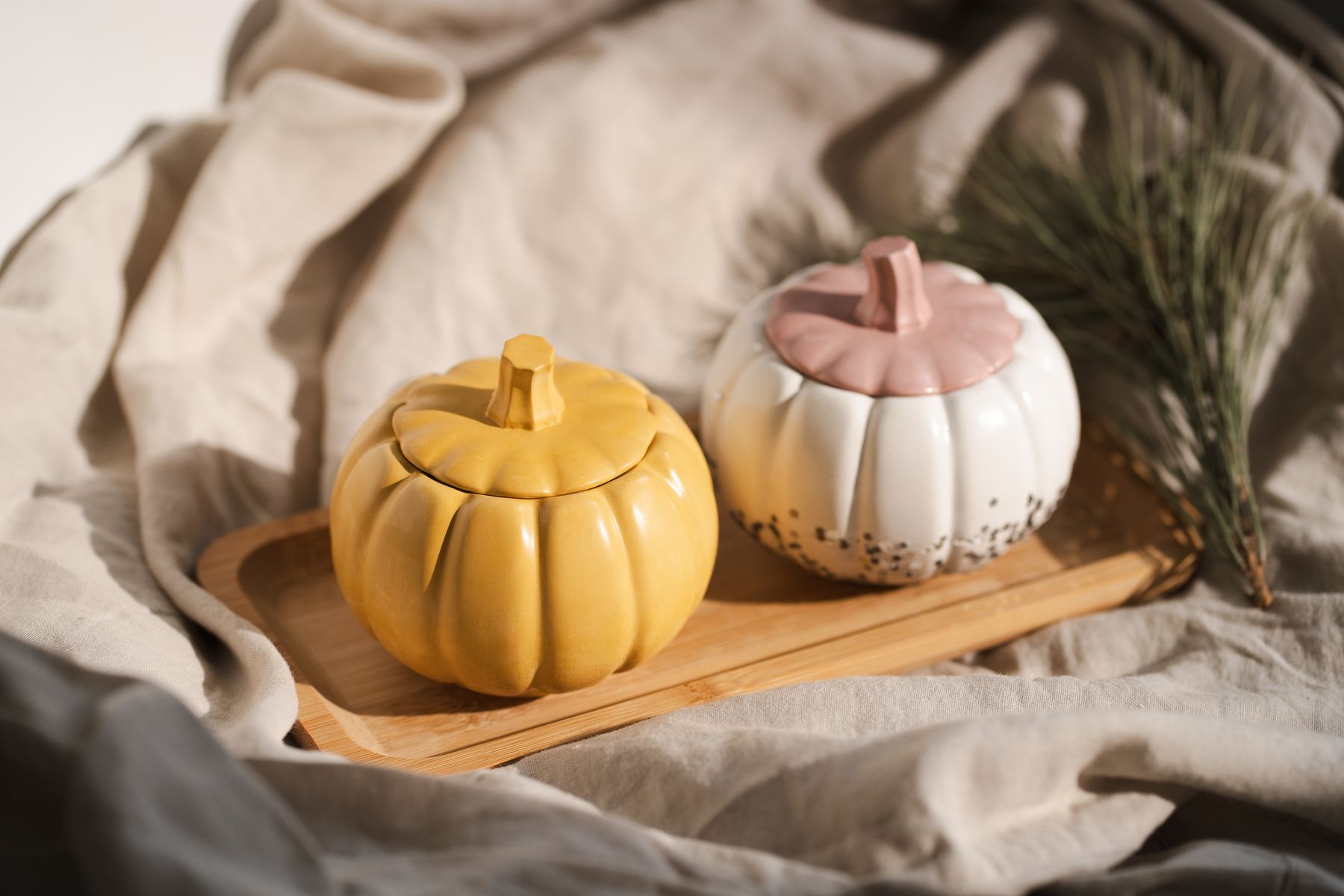 Small decorative pumpkins grouped on a tray