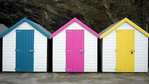 Three White Tool Sheds