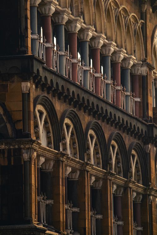 Free Close view of arched architecture in Mumbai, showcasing intricate design and historic style. Stock Photo