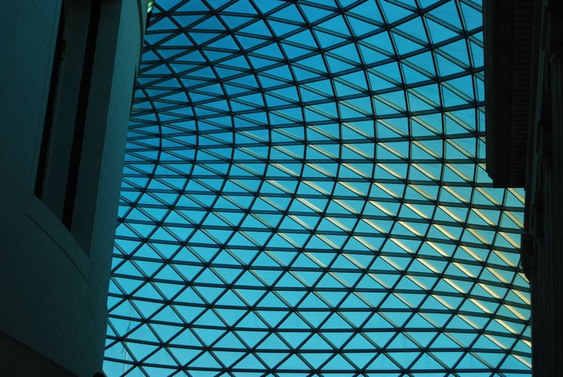 The tessellated glass roof of the British Museum's Great Court seen from below