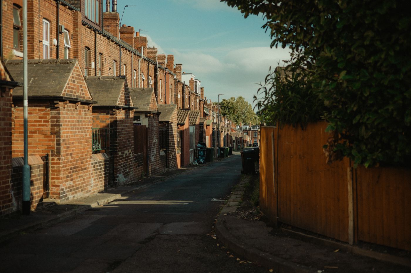 Historic red-brick terraced houses on a Leeds street