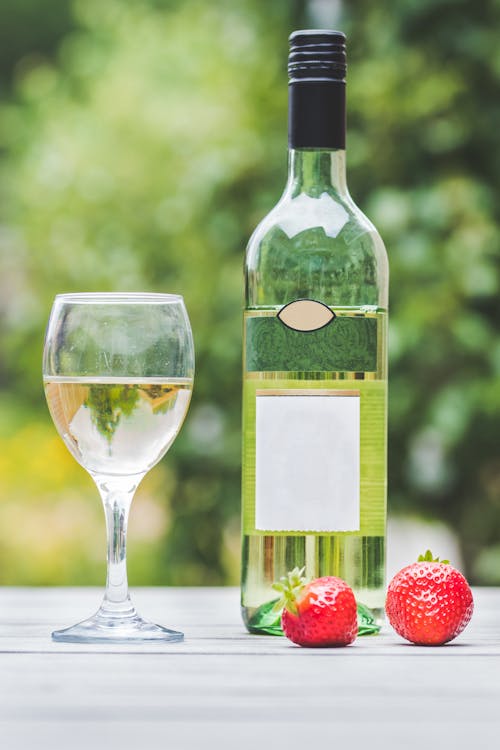 Free Wine Glass and Liquor Bottle Stock Photo