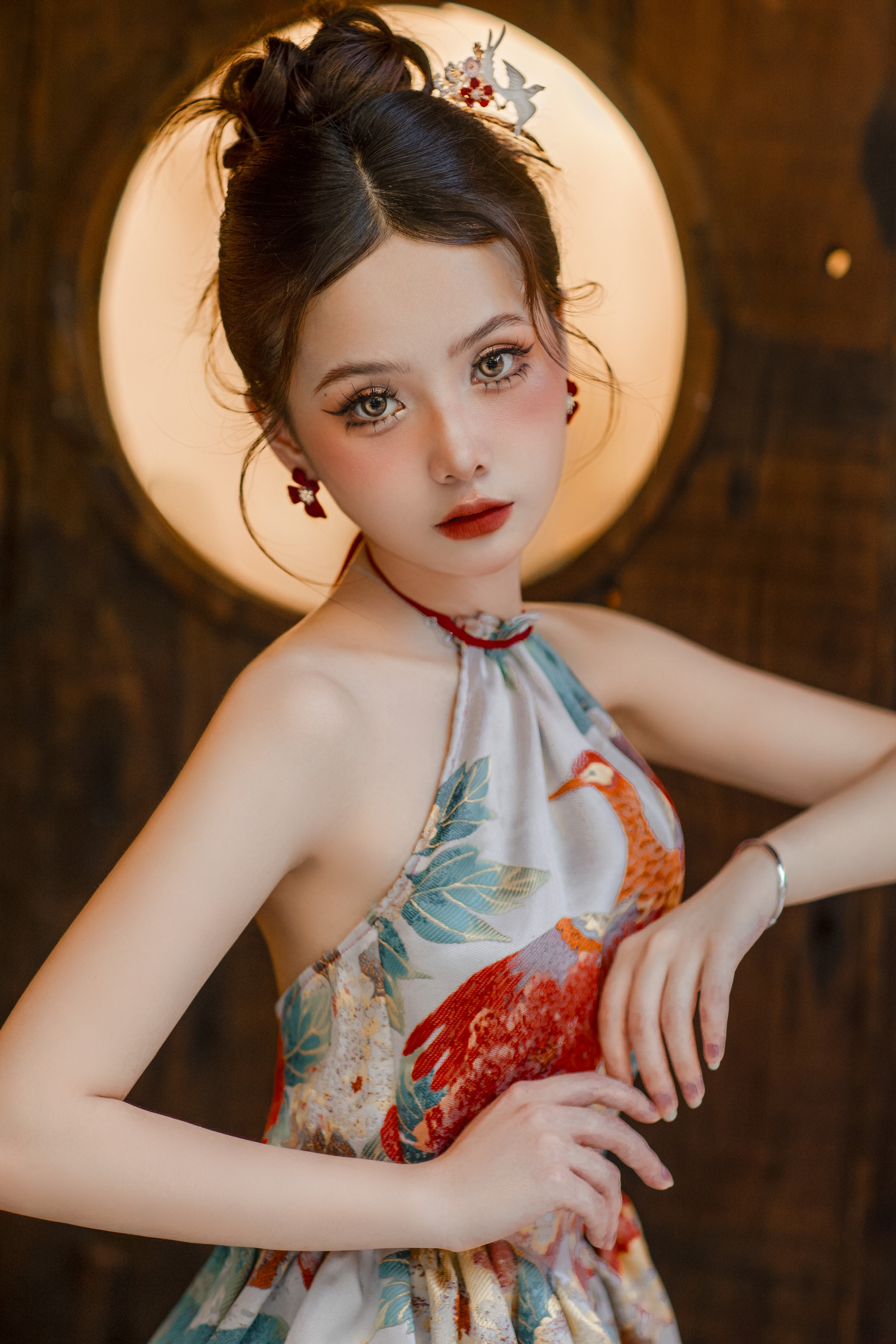 Portrait of a woman in a colorful artistic dress with soft lighting