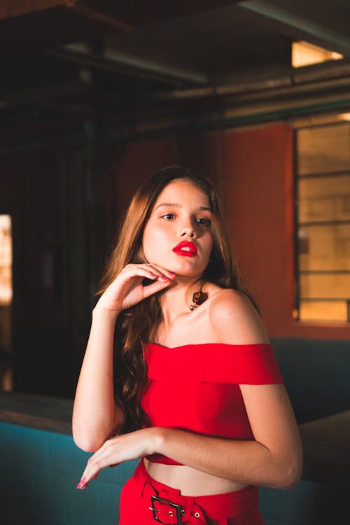 Free Woman Wearing Red Off Shoulder Crop Top Stock Photo