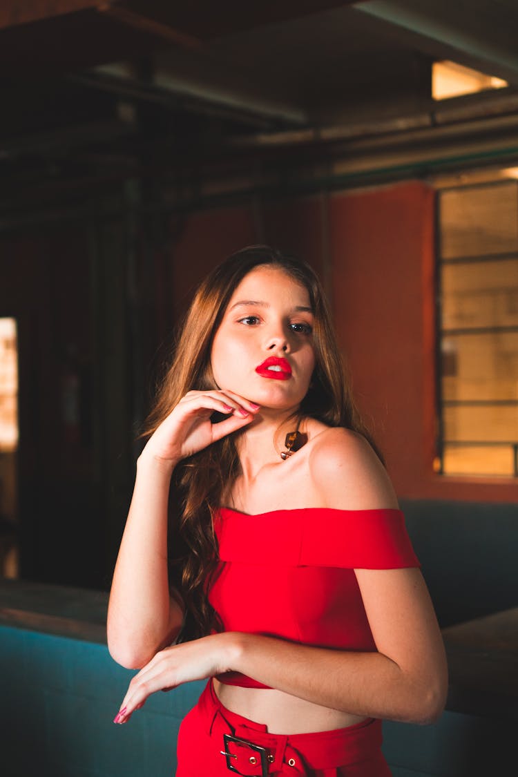 Woman Wearing Red Off Shoulder Crop Top