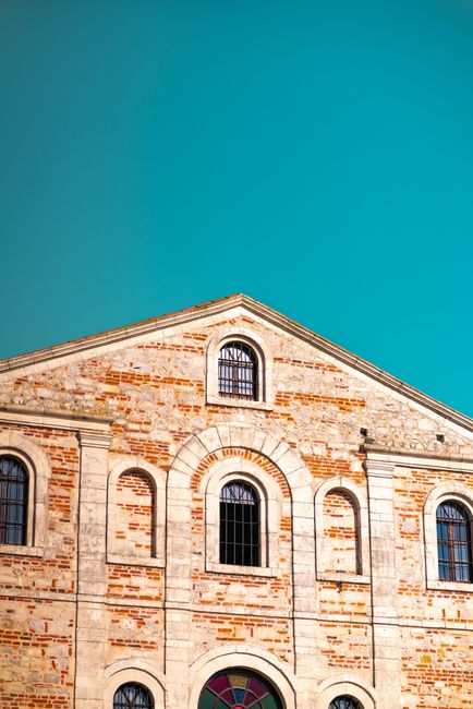 Explore the architectural beauty of St. Golyazi Panteleimon Church in Bursa, Türkiye, under a clear blue sky.