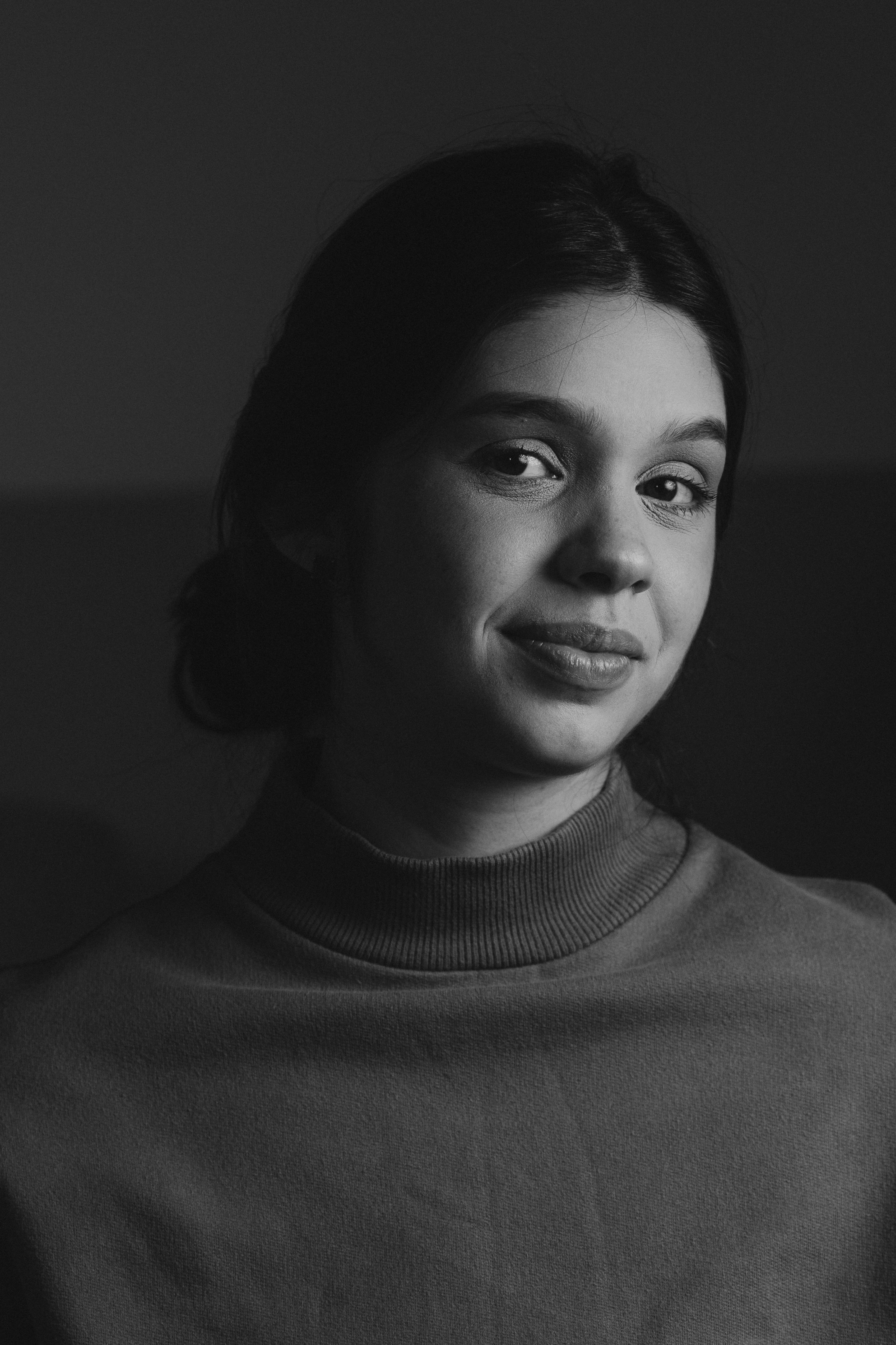 a black and white photo of a woman