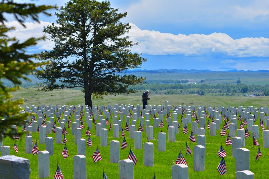 Seasonal patriotic floral tribute placed at a gravesite for Memorial Day Seasonal patriotic floral tribute placed at a gravesite for Memorial Day