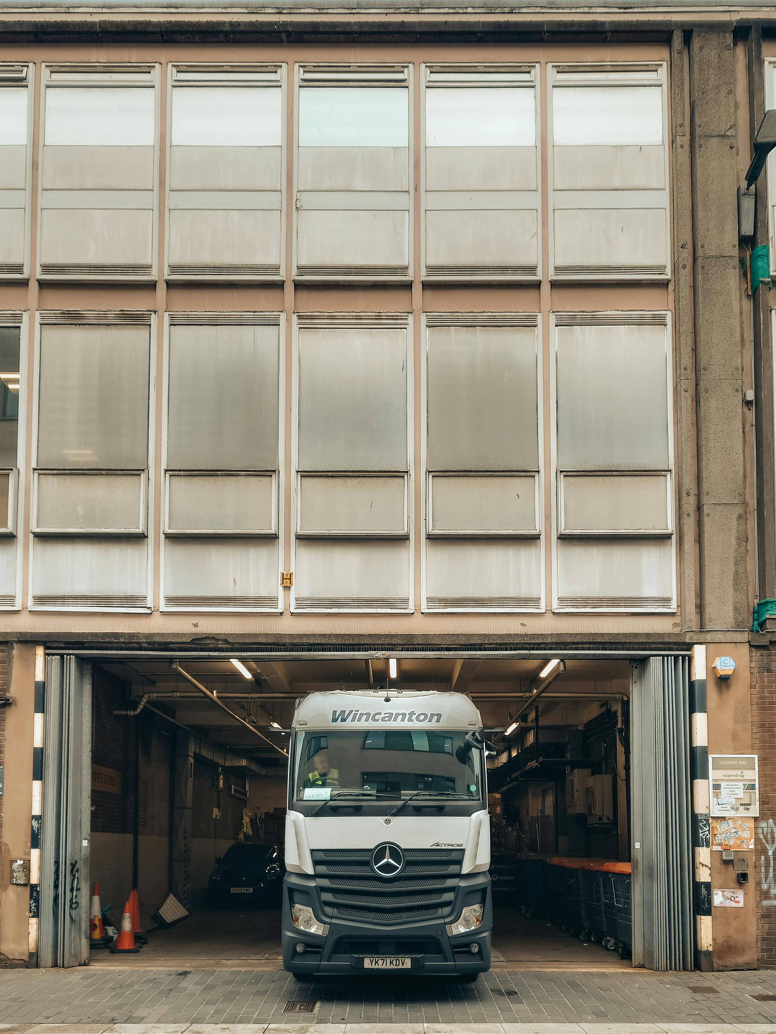 Delivery truck at urban warehouse
