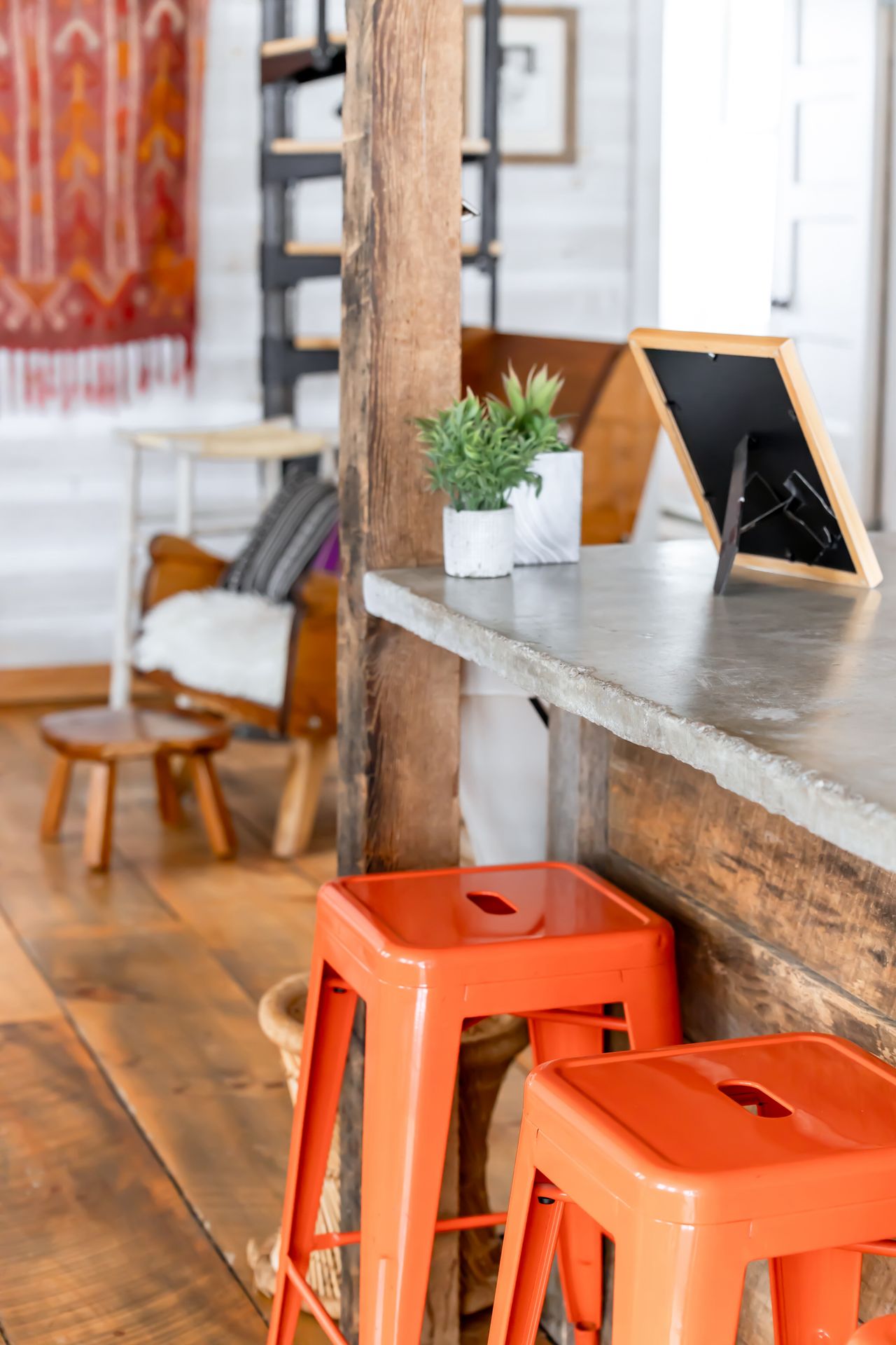 mixed-seating-kitchen-stools Rustic kitchen counter with colorful mixed stools