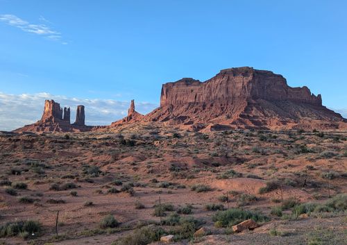 Free Stunning view of Monument Valley's iconic buttes under a clear blue sky. Stock Photo