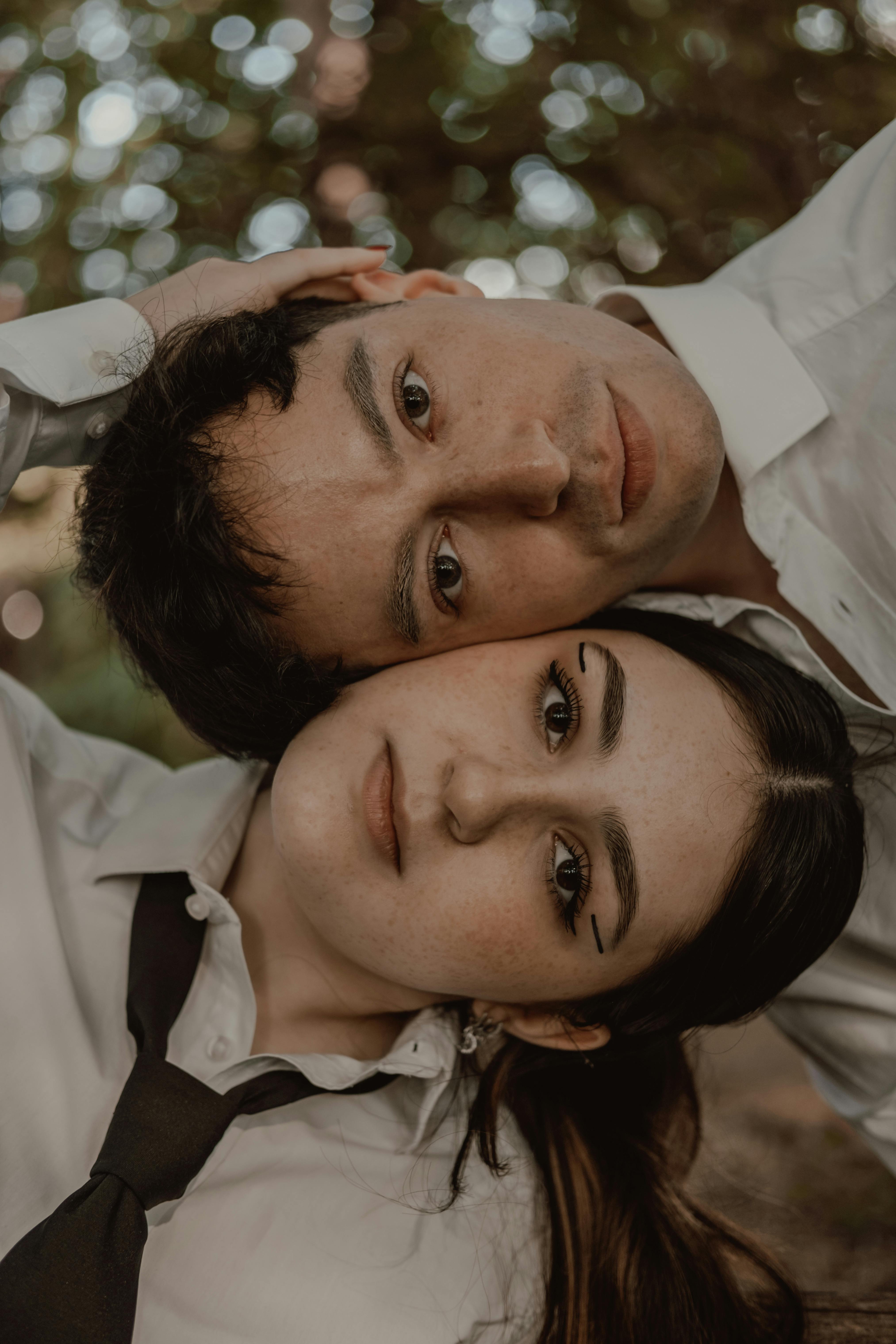 a couple in a tie pose for a photo