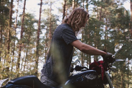 Free Man Riding on Motorcycle Stock Photo