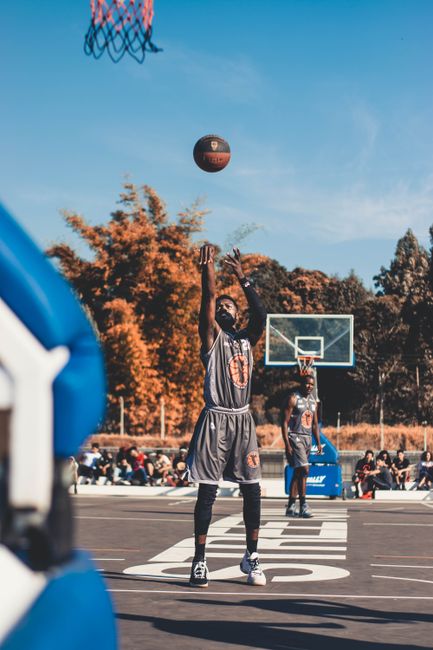 basketball player shooting court