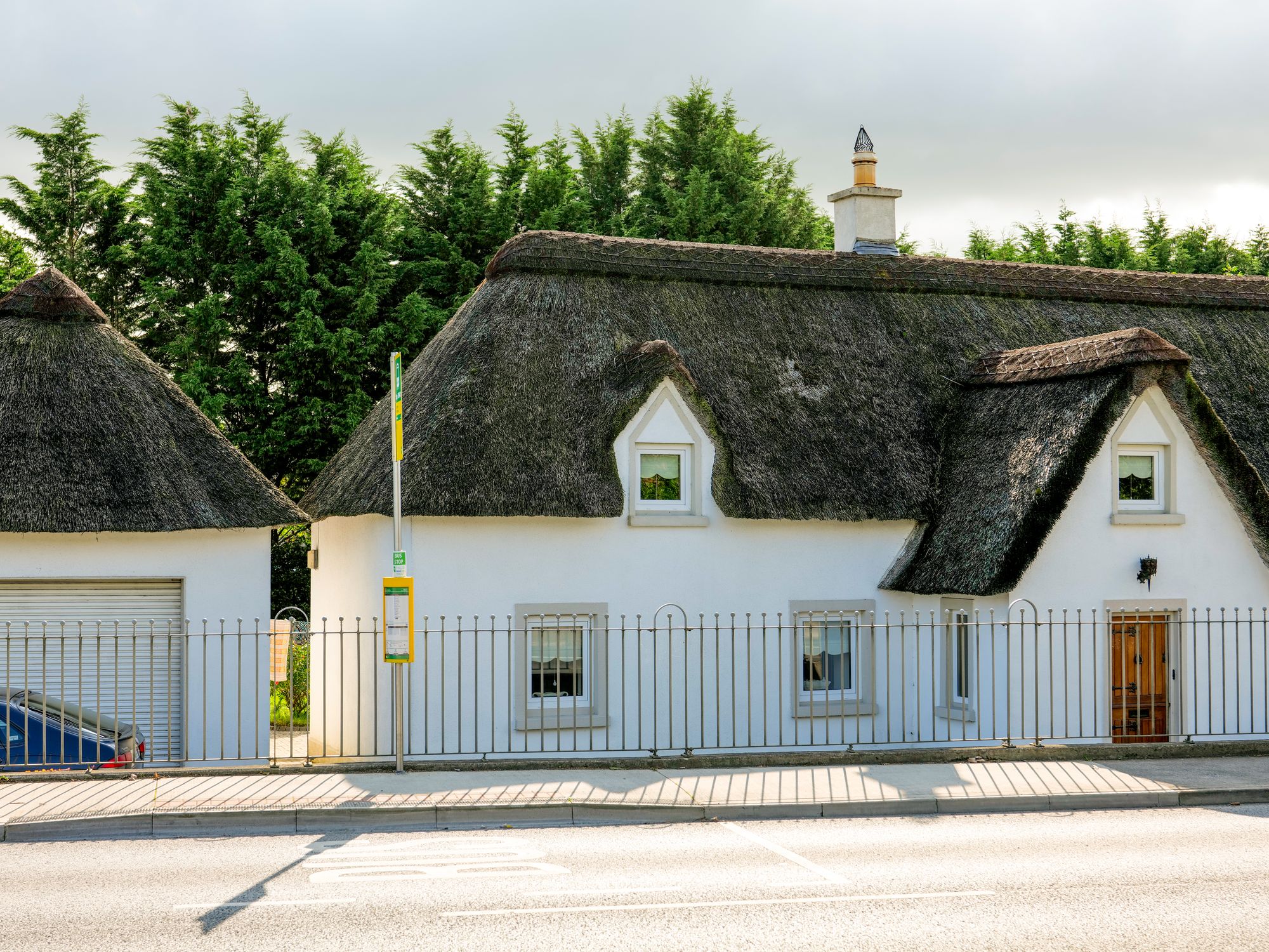 House Removals in Bonhill, Scotland — removals crew carrying furniture out to the removal lorry