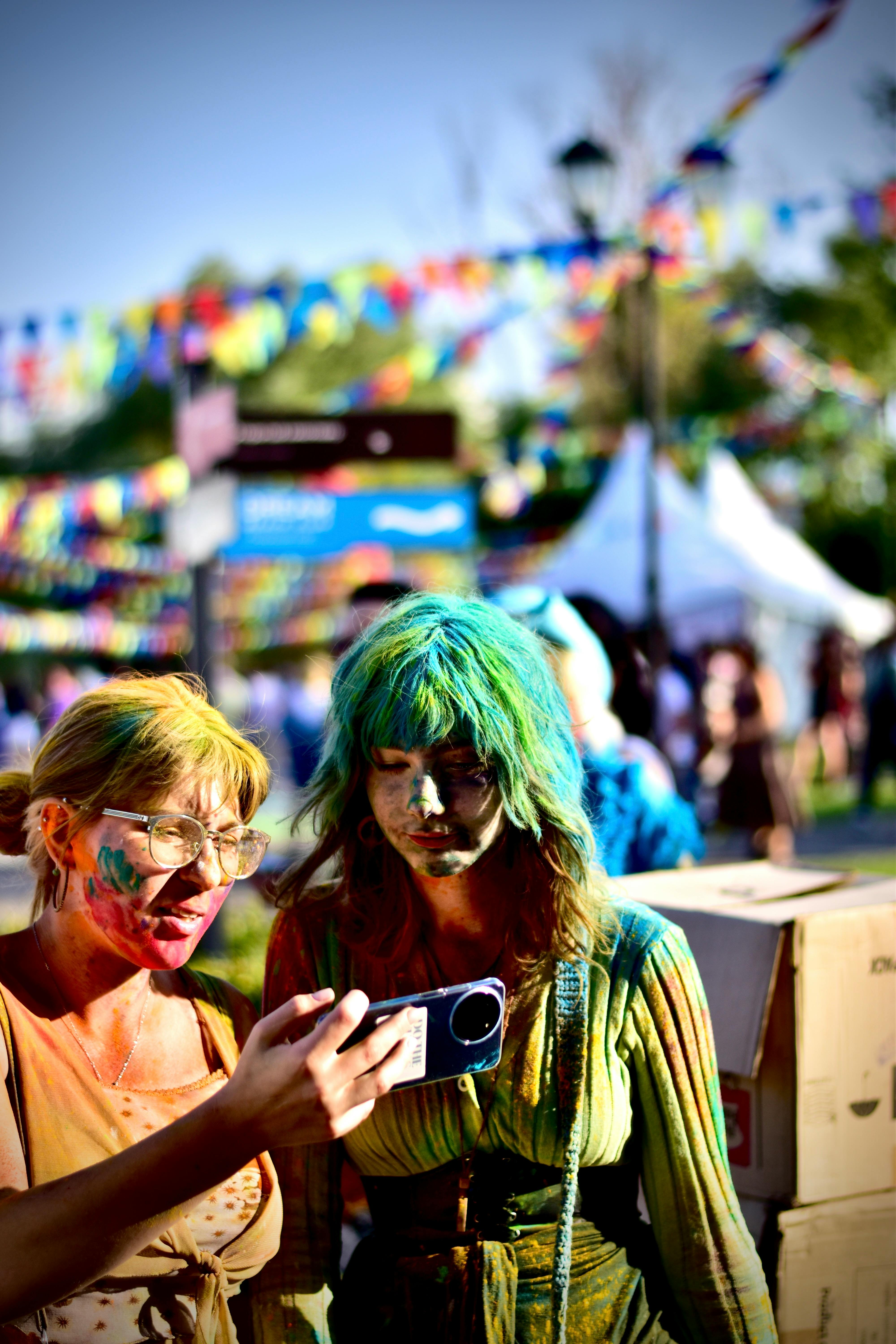 two women with painted faces