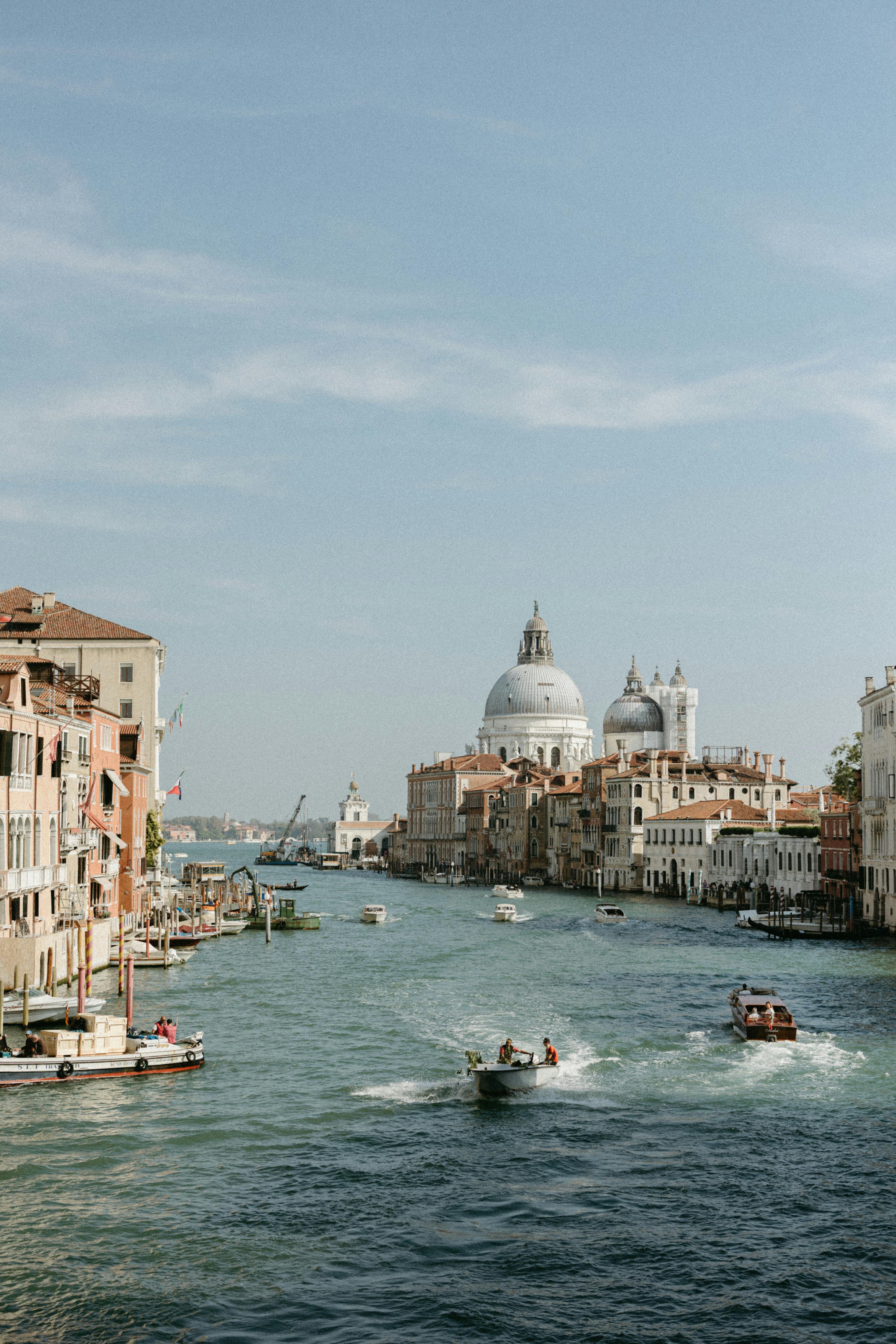 Beautiful view of Venice's Grand Canal with historic architecture and boats.