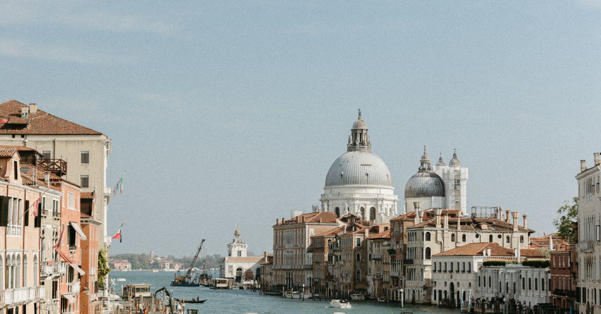 Beautiful view of Venice's Grand Canal with historic architecture and boats.