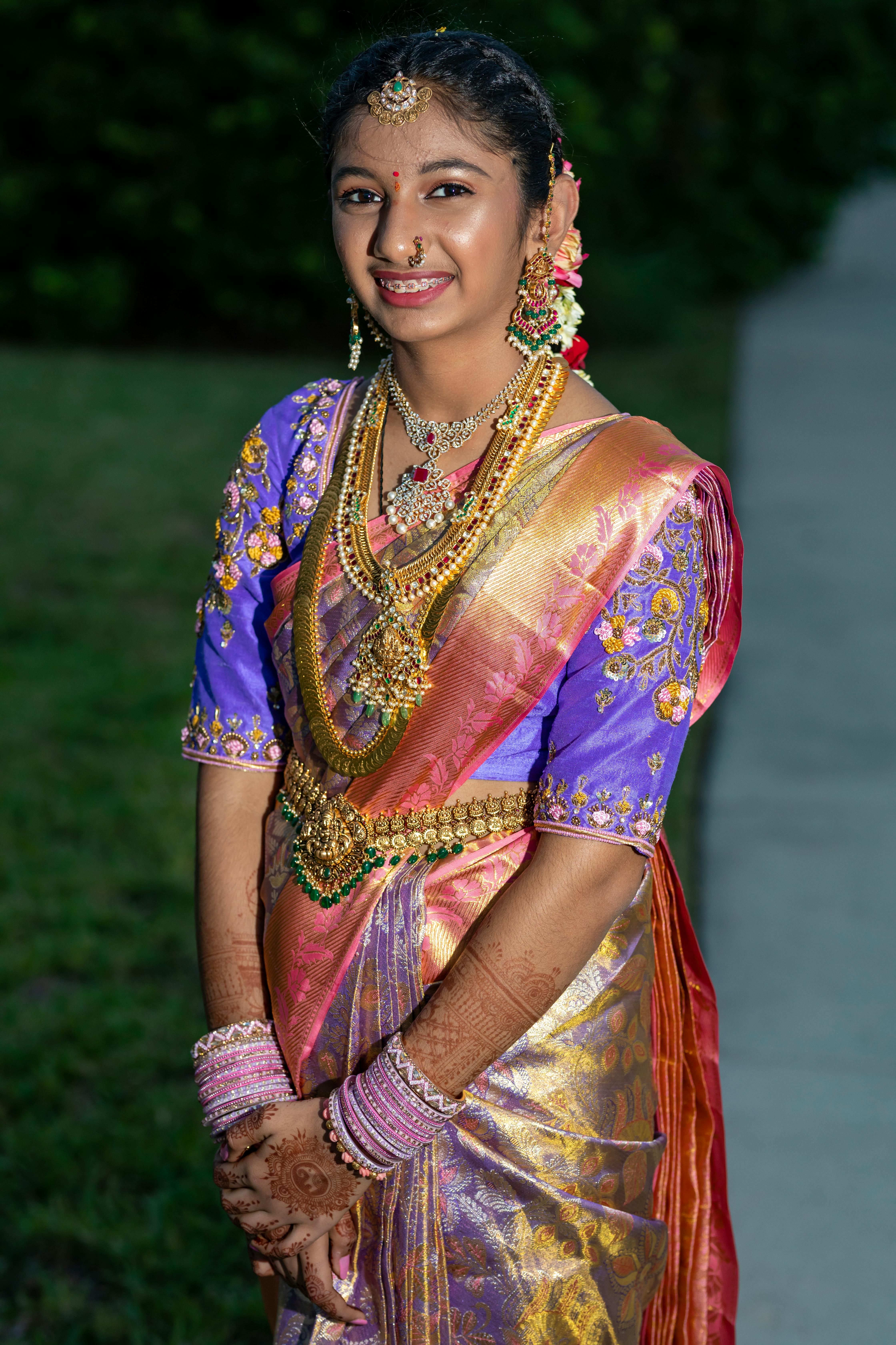 a beautiful indian woman in a traditional sari