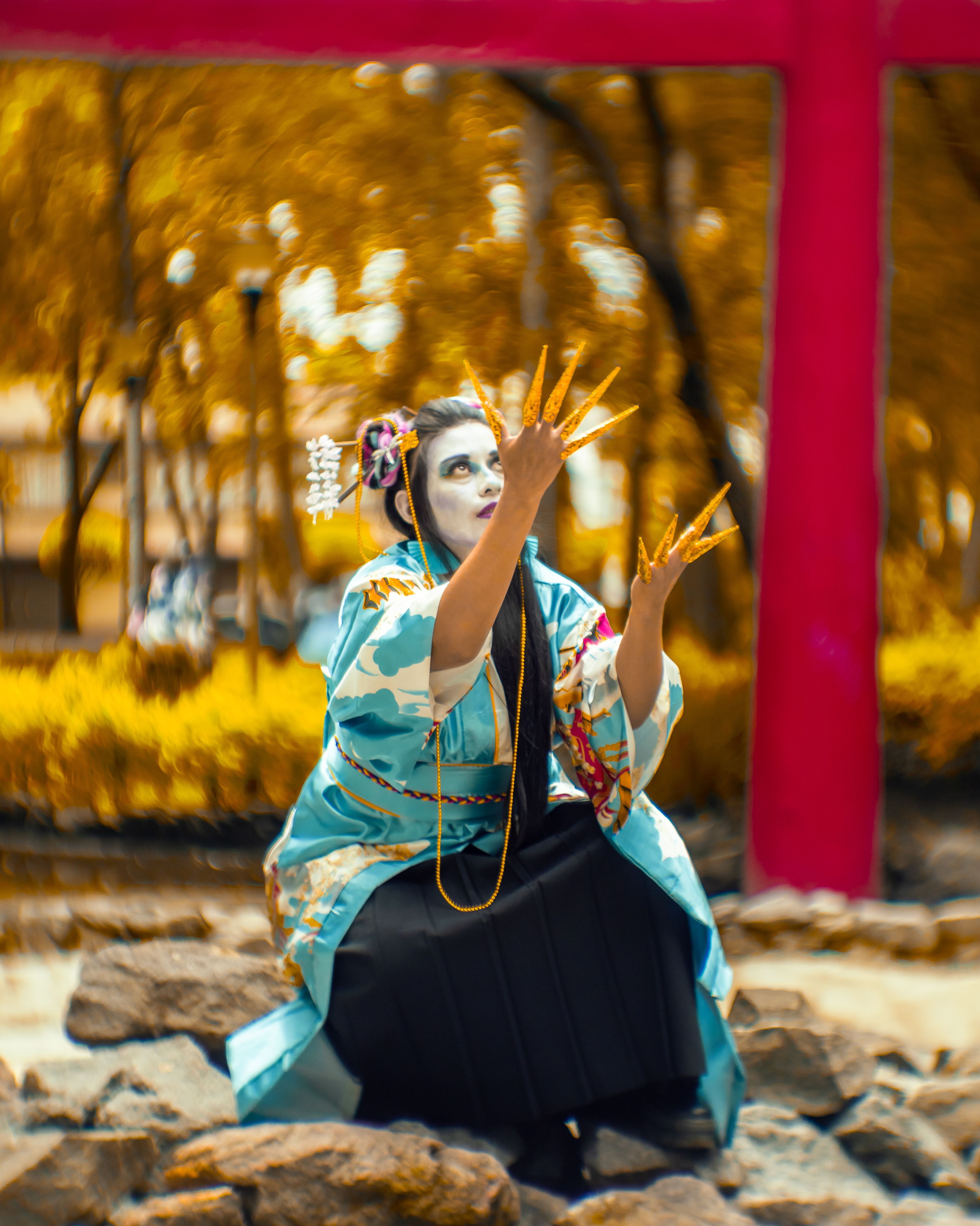 A person in traditional Japanese attire performs at a festival in Mexico City, showcasing cultural fusion.