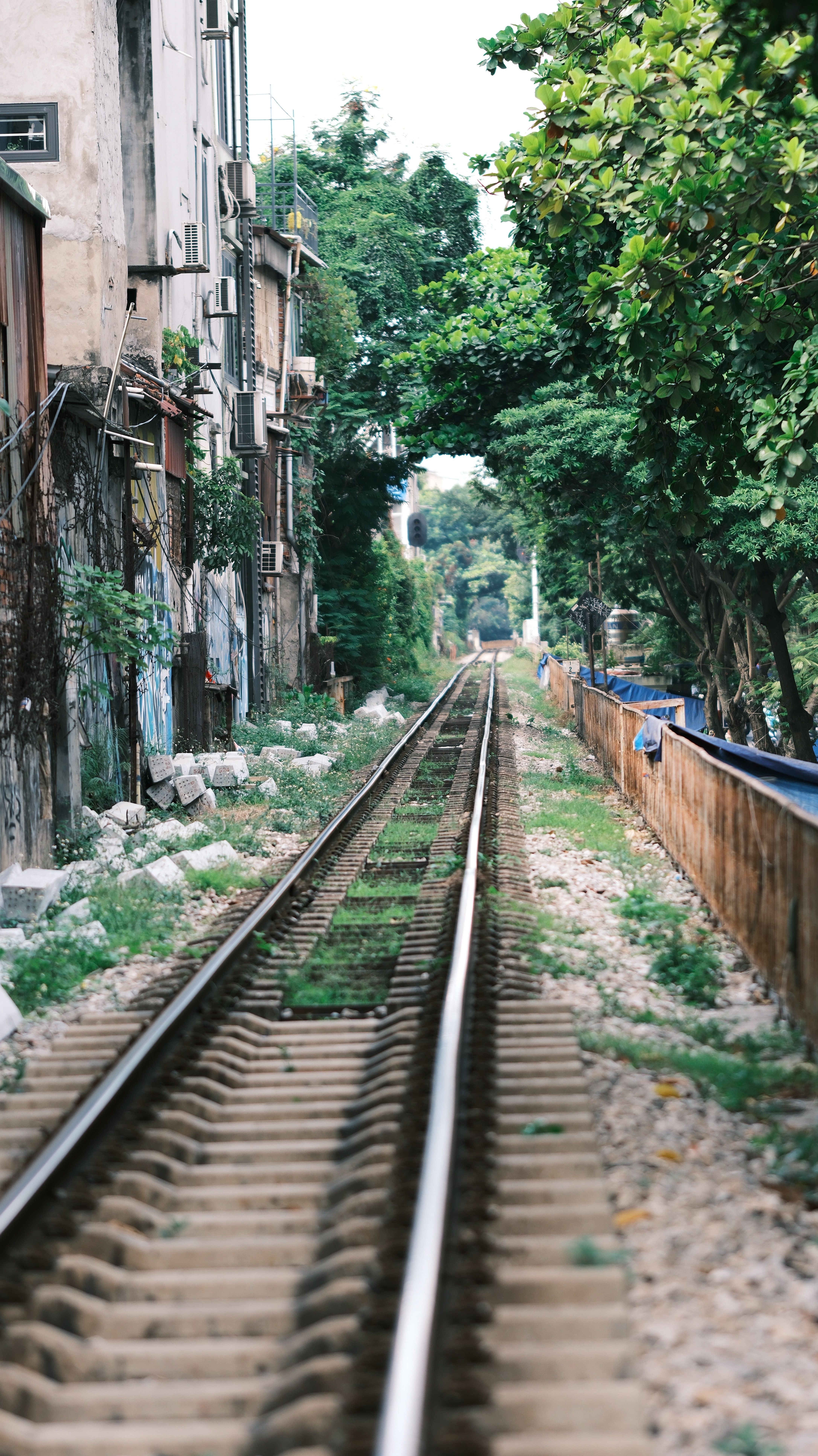 Railway Tracks along Buildings · Free Stock Photo