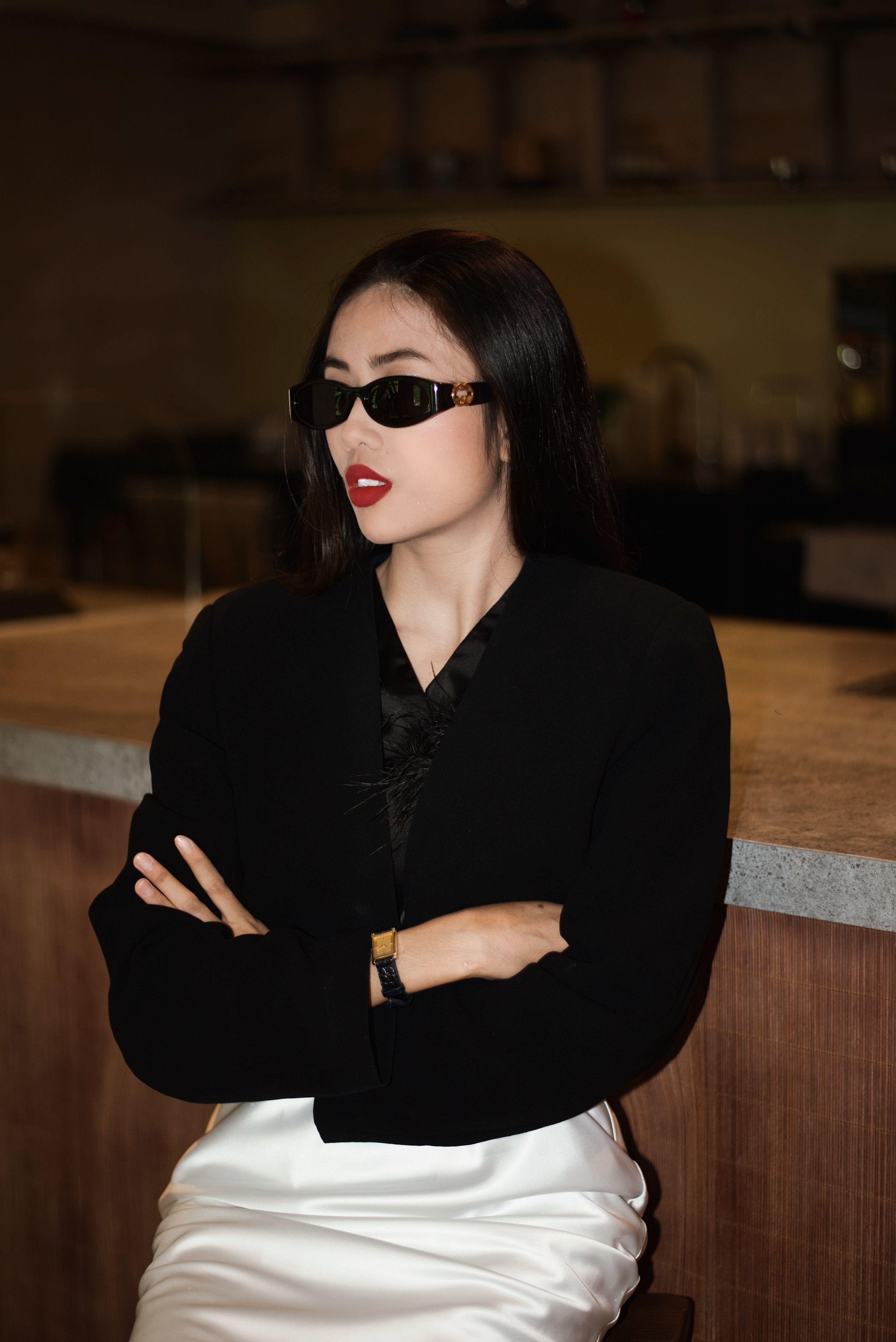 A woman in a black jacket and sunglasses · Free Stock Photo