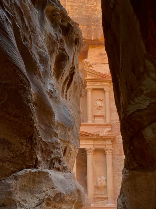 Free Stunning view of Petra's Treasury framed by canyon walls in Jordan. Stock Photo