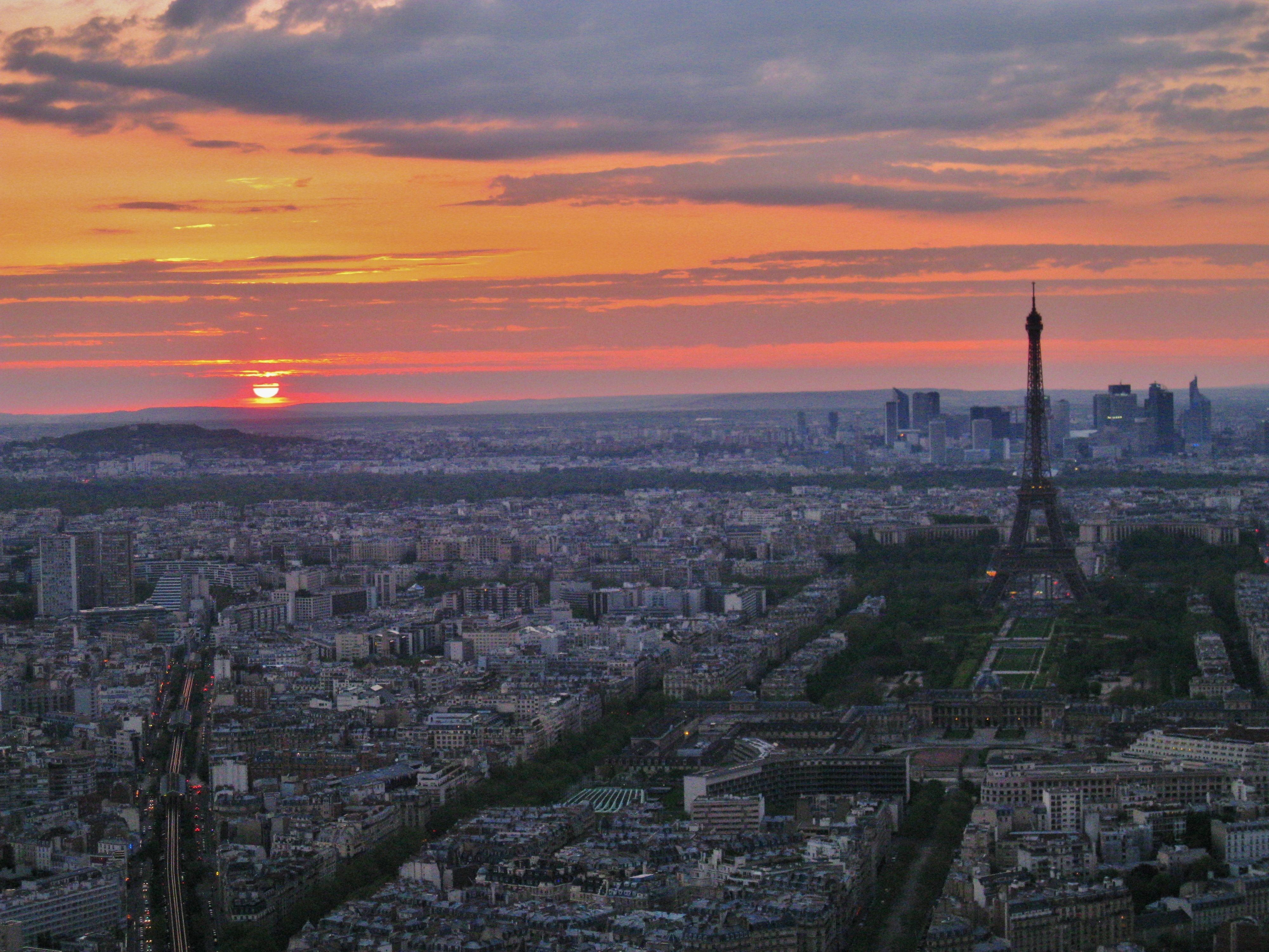 Iconic Paris skyline featuring the Eiffel Tower at sunset