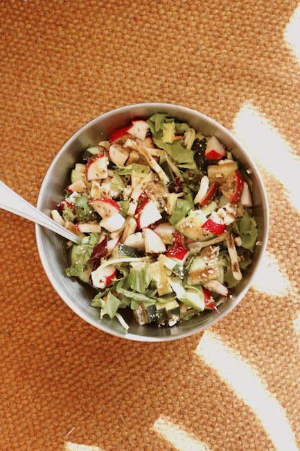 Bowl of fresh mixed vegetable salad, perfect for a healthy meal.