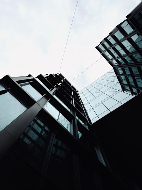 Free Modern skyscrapers with glass and steel reflecting the city's urban landscape. Stock Photo