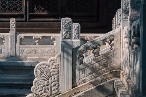Free Ornate stone architectural details showcasing traditional craftsmanship at a historical temple. Stock Photo