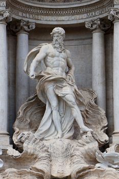 Detailed view of Oceanus, a magnificent sculpture at the iconic Trevi Fountain in Rome, Italy.