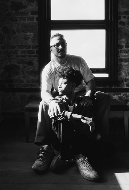 Emotional black and white photo of a father and son in a vintage setting, İStanbul.