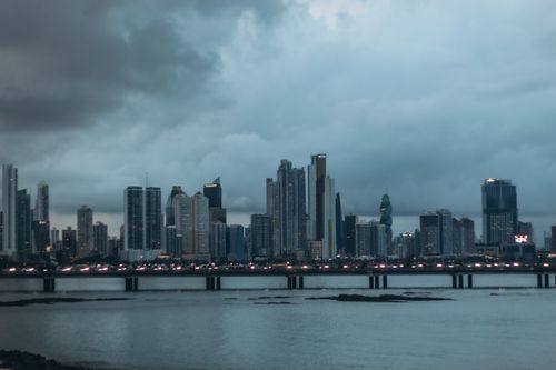 Free Gorgeous view of Panama City skyline with skyscrapers at twilight over the waterfront bridge. Stock Photo