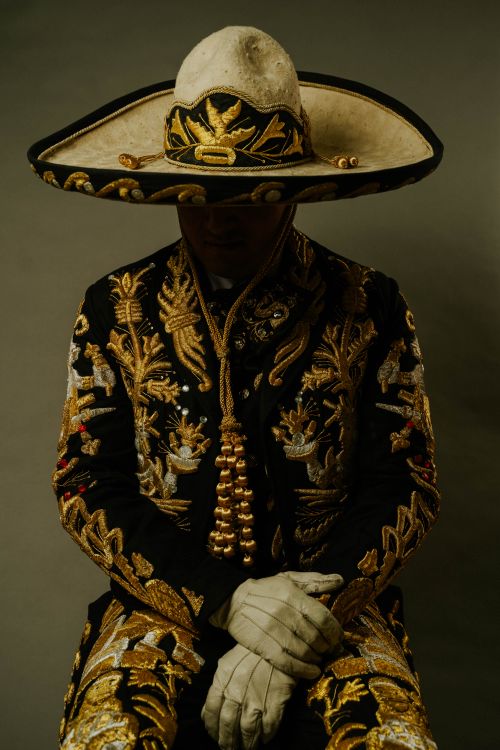Free Matador wearing an intricately embroidered costume and large hat, representing traditional culture. Stock Photo