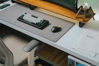A Keyboard and a Mouse on a Desk